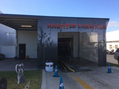 Custom Graphics Transform a Car Wash into a Haunted House